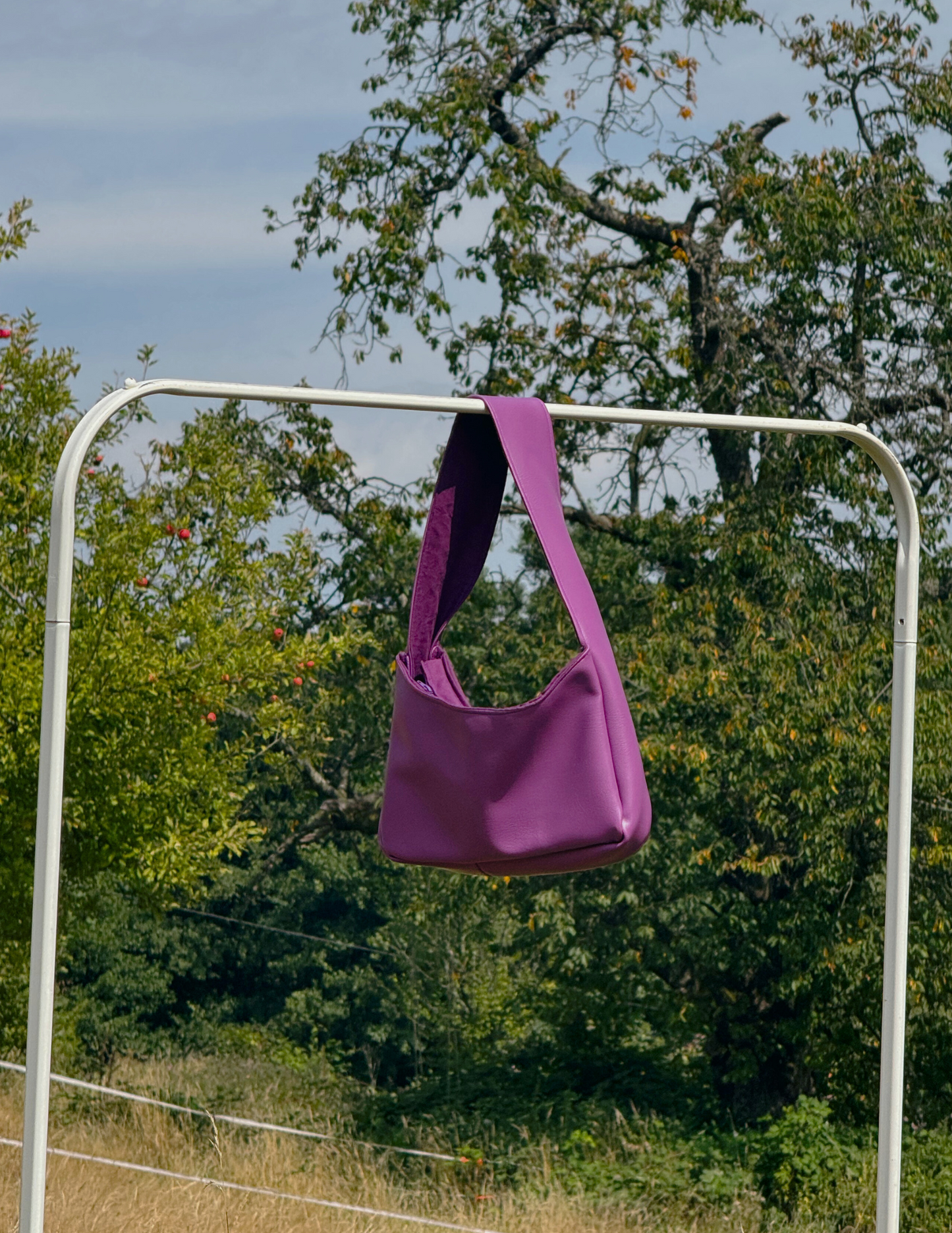 Kunstleder. Medium. Lila.