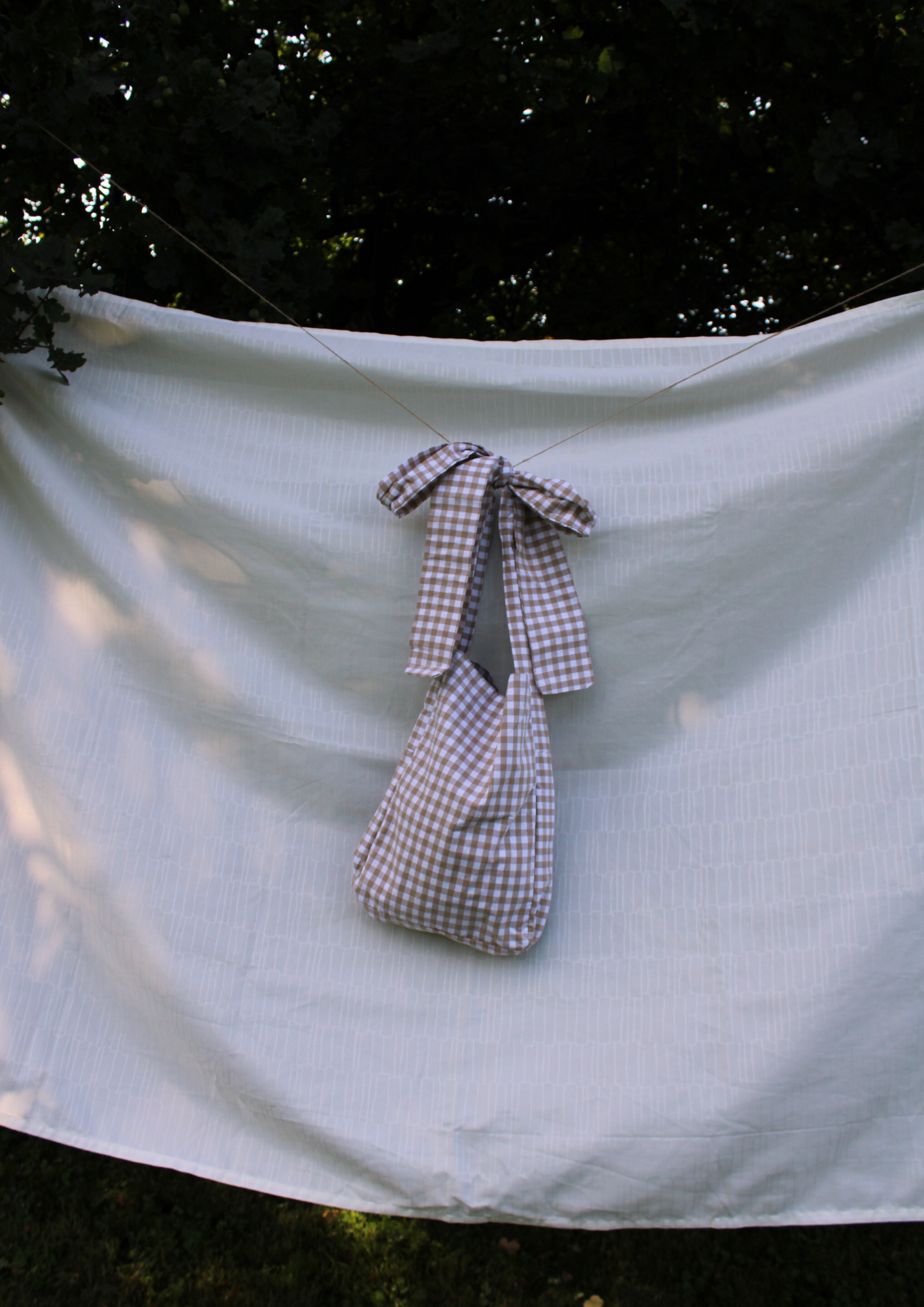 Baumwolle. Tote. Beige kariert.