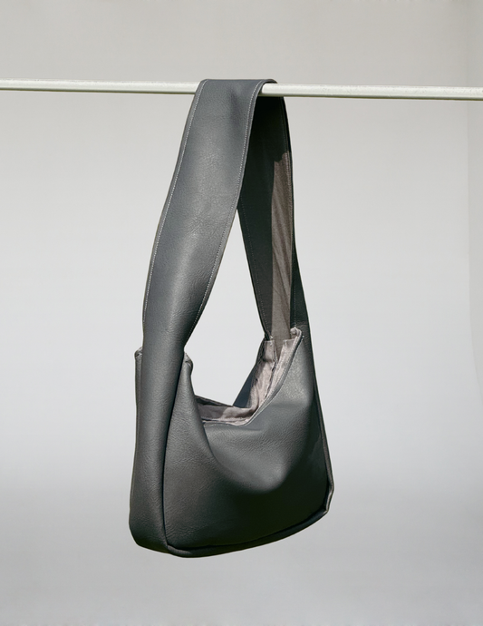 Kunstleder. Medium. Grau.