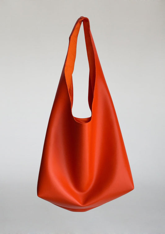 Kunstleder. Maxi. Orange.